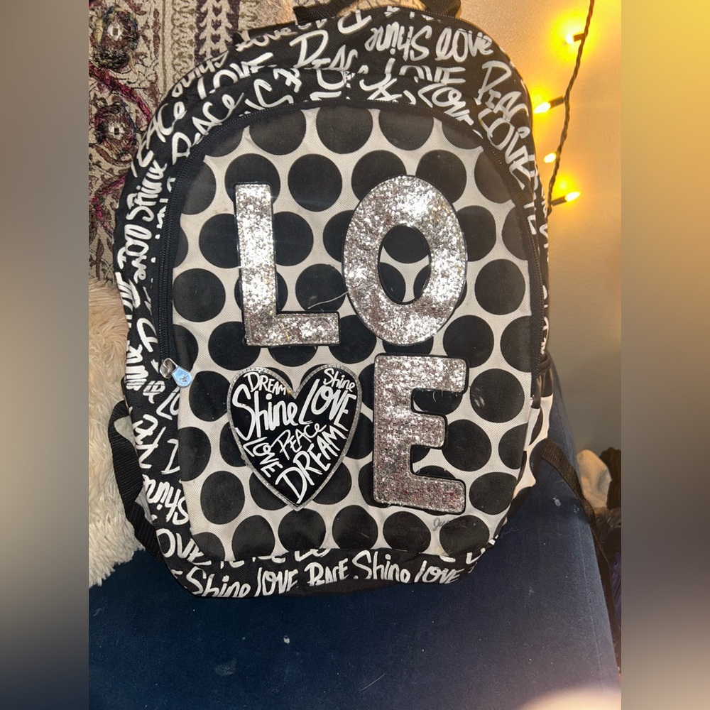 Black and white Love Justice backpack
